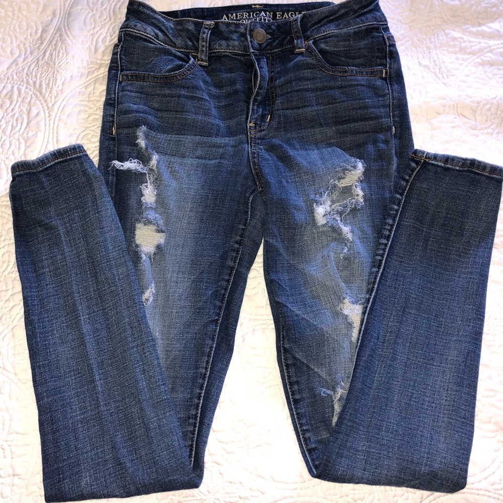 Destroyed medium wash denim jeggings
